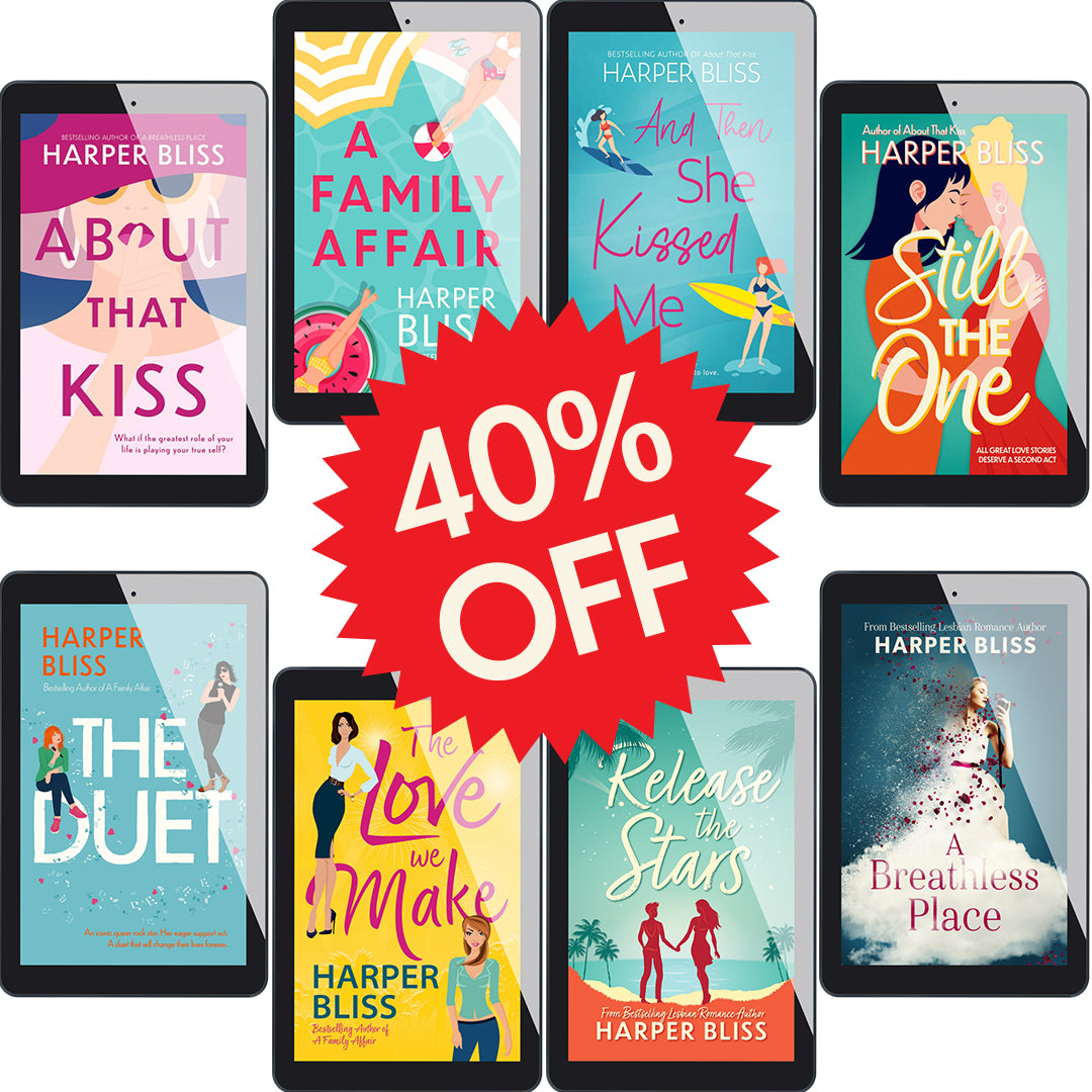 The BlissVerse E-book Bundle, 8 tablets each showing the cover of one book. The books shown are About That Kiss, A Family Affair, And Then She Kissed Me, Still the One, The Duet, The Love We Make, Release the Stars and A Breathless Place. In the middle of the image is a red star sticker with the white text "40% OFF".